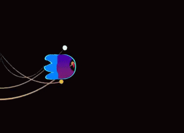 a blue and purple jellyfish is floating in the dark .