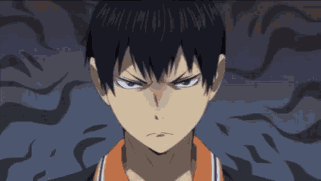 a close up of a person 's face with a very angry look on their face