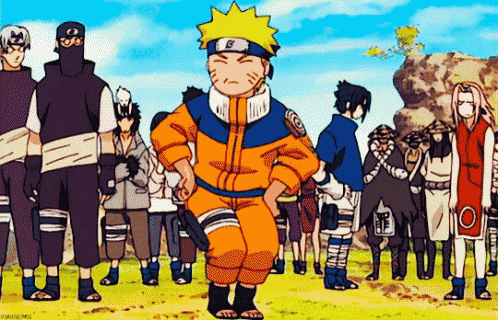 a group of people are standing around a cartoon character , naruto , in a field .