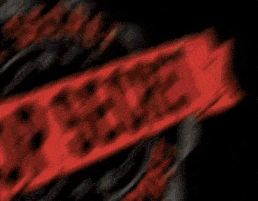 a top secret stamp with a bullet hole in the center