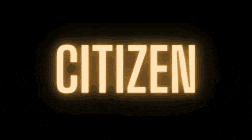 the word citizen is glowing brightly in a dark background