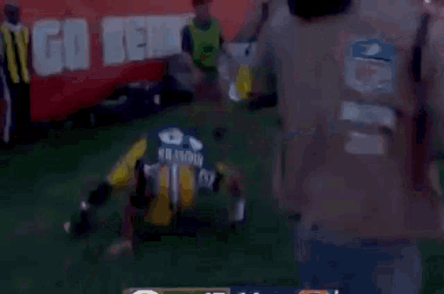 a football player with the number 12 on his shirt