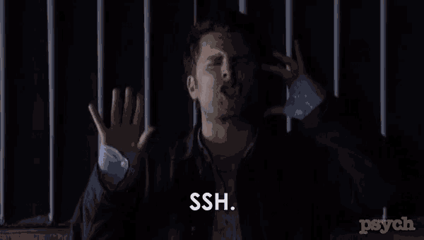 a man behind bars says ssh in front of a logo for psych