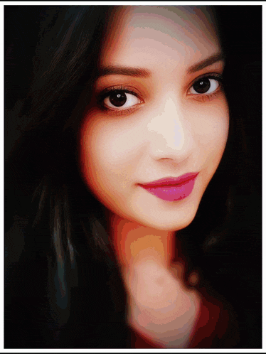 a close up of a woman 's face with pink lips
