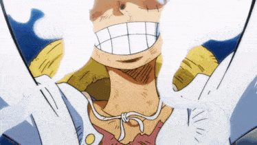 a close up of a person 's face with a huge smile
