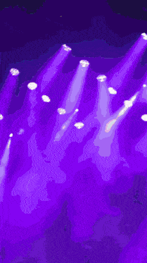 a purple background with a bunch of pictures on it and a purple light