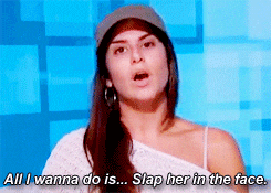 a woman in a baseball cap says " all i wanna do is slap her in the face "