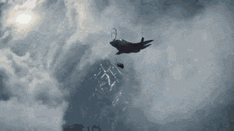 a plane is flying through a cloudy sky while a person is falling from it