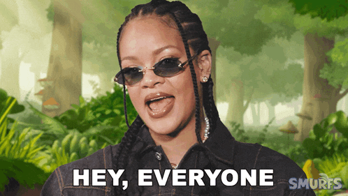 a woman wearing sunglasses says " hey everyone " in front of a forest