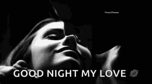 a black and white photo of a man kissing a woman with the words good night my love written on the bottom