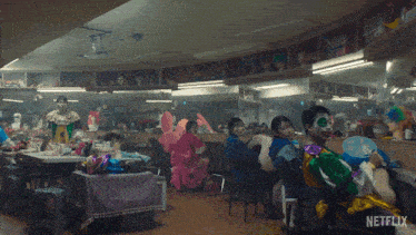 a netflix ad shows a group of people in costumes in a room