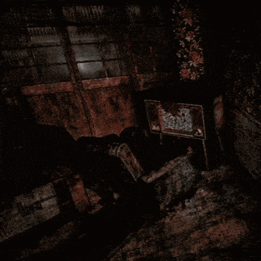 a dark room with a tv on the floor and a sign on the wall that says ' lr '