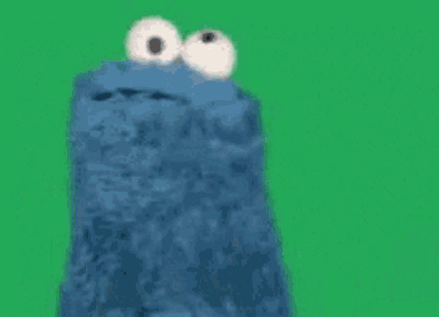 cookie monster from sesame street says suck my on a green background