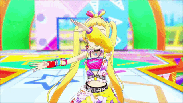 a girl in a colorful outfit with the word shake on her waist