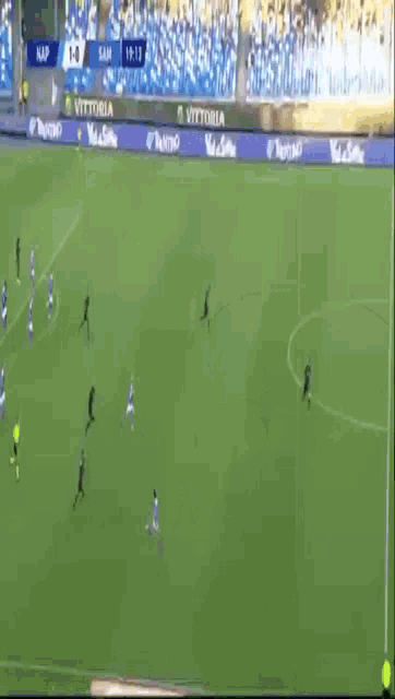 an aerial view of a soccer field with a banner for vitoria