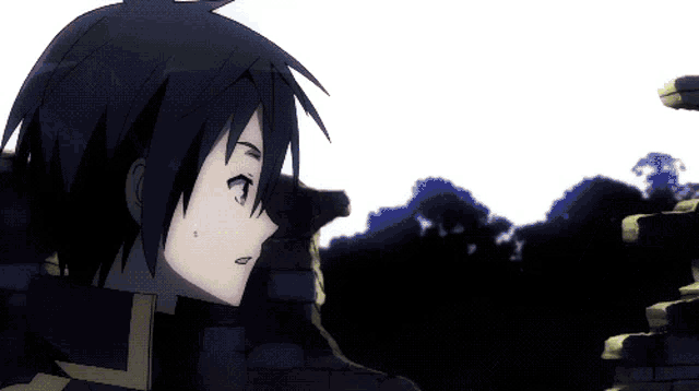a boy with black hair is standing in front of a wall