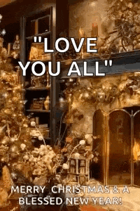 a christmas tree is in a living room next to a fireplace and says `` love you all '' .
