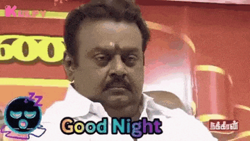 a man in a white shirt is saying good night in a cartoon .