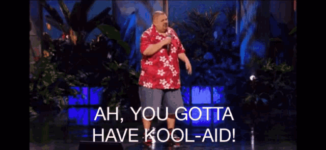 a man in a hawaiian shirt is holding a microphone and saying " ah you gotta have kool aid "