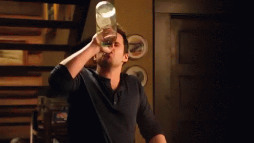 Alcohol Face GIF - New Girl Bloopers Nick Miller GIFs