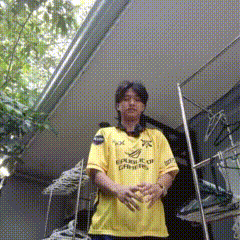 a man in a yellow shirt that says republic of gamers on it