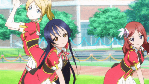 three anime girls are posing for a picture in a field