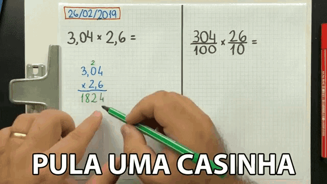 a person is writing on a piece of paper with the words pula uma casinha
