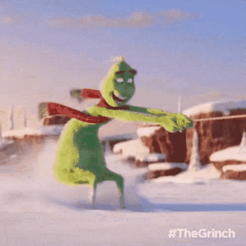 a grinch from the movie the grinch is dancing in the snow .