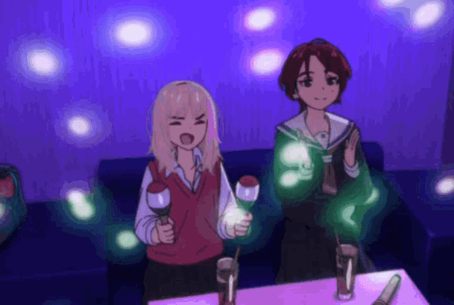 two anime girls singing into microphones in a room with purple lights