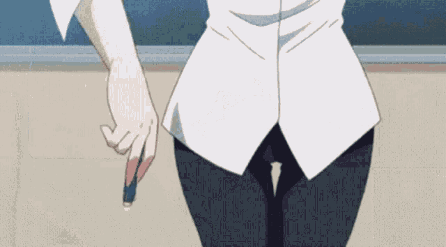 a girl in a white shirt is holding a blue eraser .