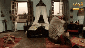 a bedroom with a canopy bed and a sign that says ' shoff ' on it