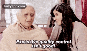 an elderly woman is sitting next to a younger woman .
