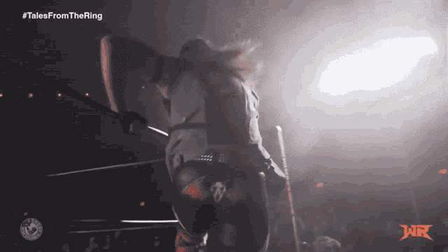 a woman in a wrestling ring with the words tales from the ring
