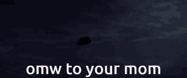 omw to your mom is written in white letters on a dark background