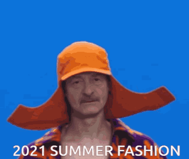 a man wearing an orange hat and a purple shirt with the words 2021 summer fashion written below him
