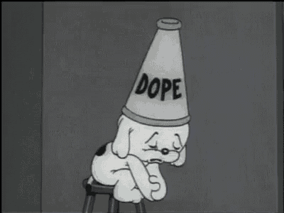a cartoon dog is sitting on a stool wearing a dope cone on its head .
