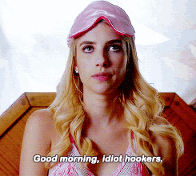a blonde woman wearing a pink sleep mask says good morning idiot hookers