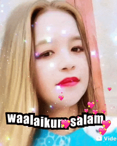 a little girl with hearts around her and the words waalaikur salam