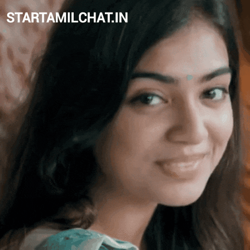 a close up of a woman 's face with the words startamilchat.in visible