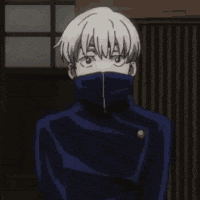 a close up of a person wearing a mask and a jacket .