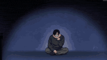 a man with a mask on his face is standing in front of a wall with blood on it