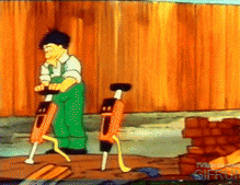 a cartoon of a man holding a hammer with a brick wall behind him