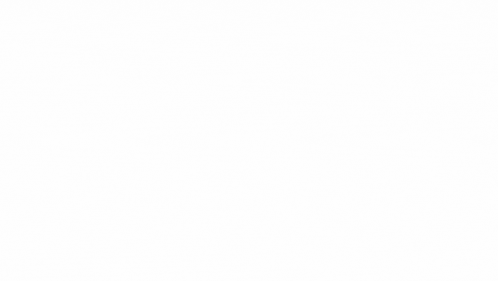 a close up of a handwritten signature on a white surface