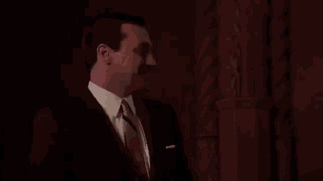 don draper from mad men is wearing a suit and tie and saying `` never felt better in my life '' .
