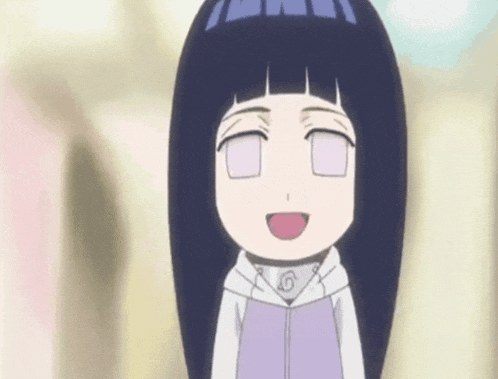 a close up of a cartoon girl with her eyes closed and a purple shirt .