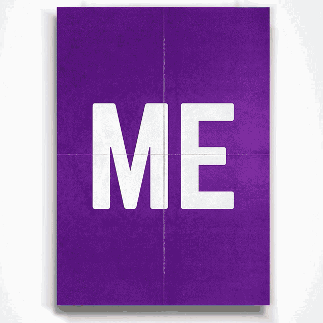 a purple paper with the word me written in white