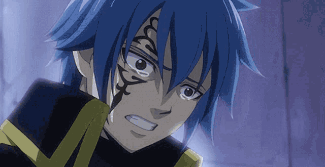 a close up of a person with blue hair and a tattoo on their face
