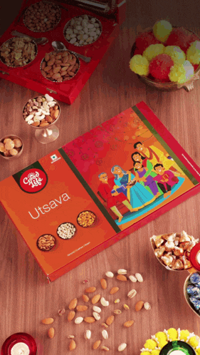 a box of utsava nuts sits on a wooden table surrounded by bowls of nuts