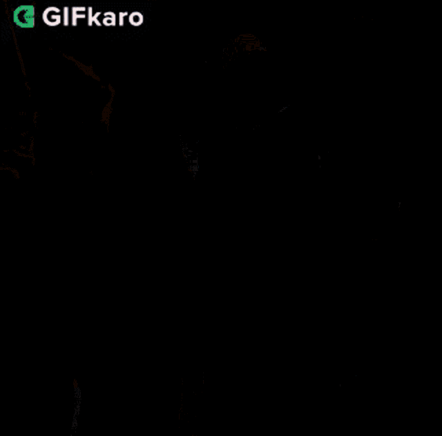 a group of men are standing next to each other in a room with a gifkaro logo in the corner