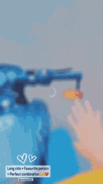 a person is holding a bottle of water and a bottle of soap .